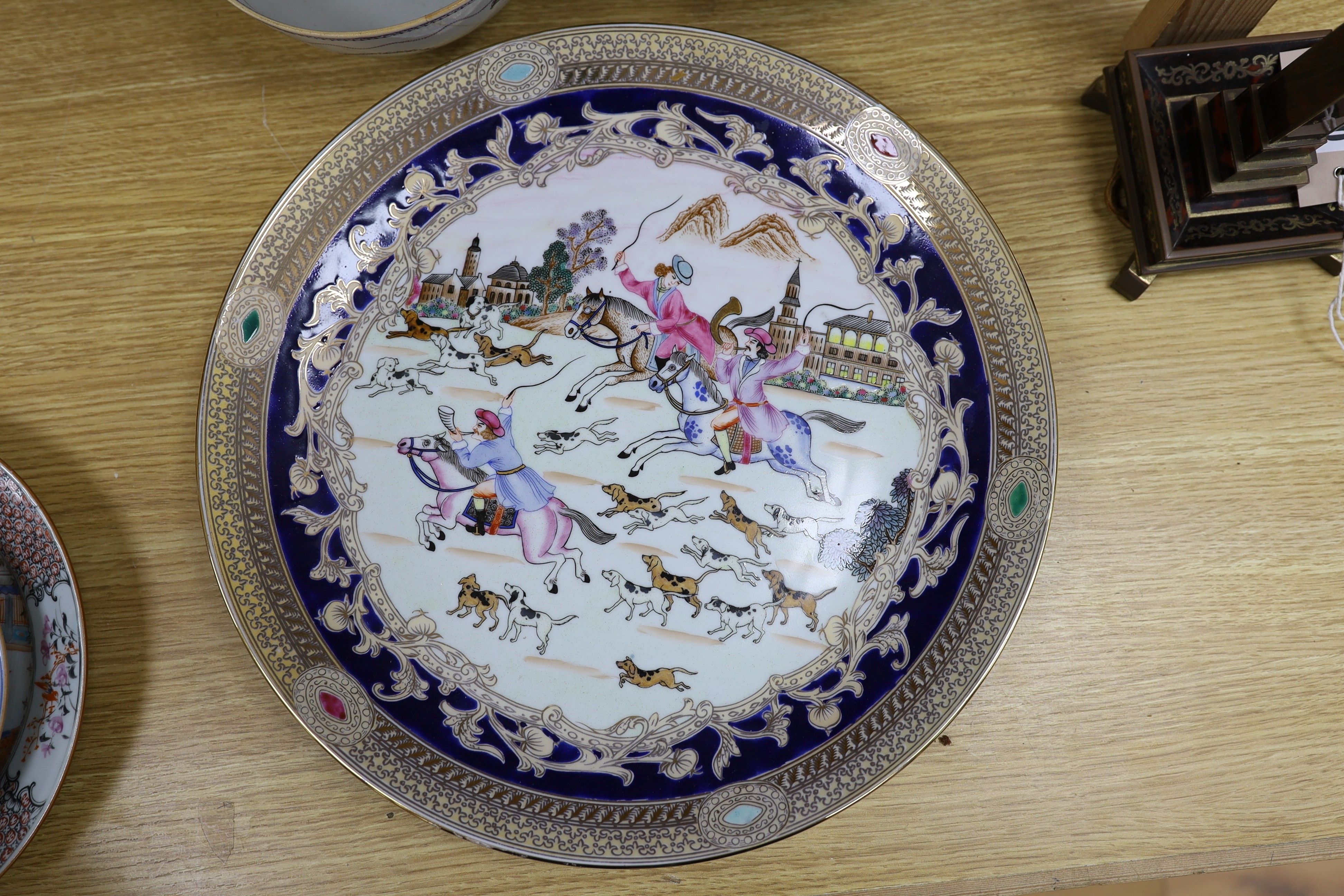A group of 18th century and later Chinese enamelled and blue and white porcelain dishes and three bowls, Largest dish 35.5 cm diameter